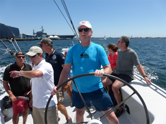 Kevin Regan at the catamaran helm